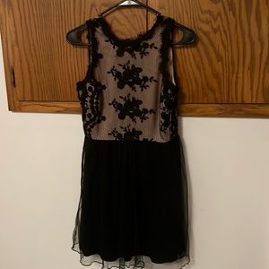 Nude and black dress